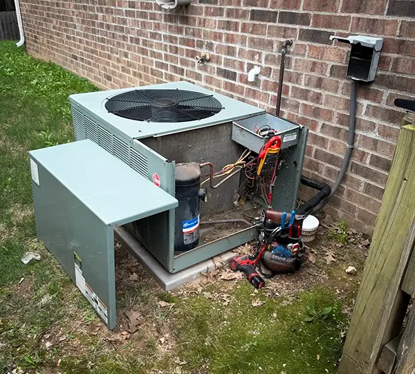 Routine maintenance on a ductless mini-split unit.